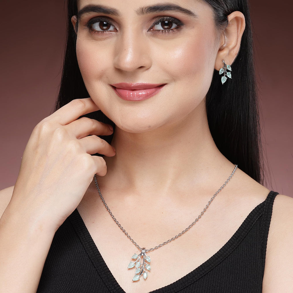 ZENEME Rhodium Plated Silver Toned American Diamond Studded Shimmery Leaf Pendant & Earring Jewellery Set for Women & Gifts For Girls